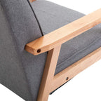 Grey upholstered accent armchair with curved beech wood armrest and fabric seat