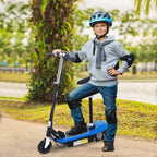 Blue electric kids scooter with rider, kickstand down and front wheel visible