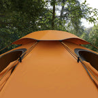 Orange dome tent roof and interior openings; arched support poles visible