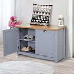 Grey shoe cabinet bench with oak top, one door open to show shoes on inner shelves