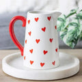 Heart-pattern ceramic flower jug, white body with red handle and red hearts