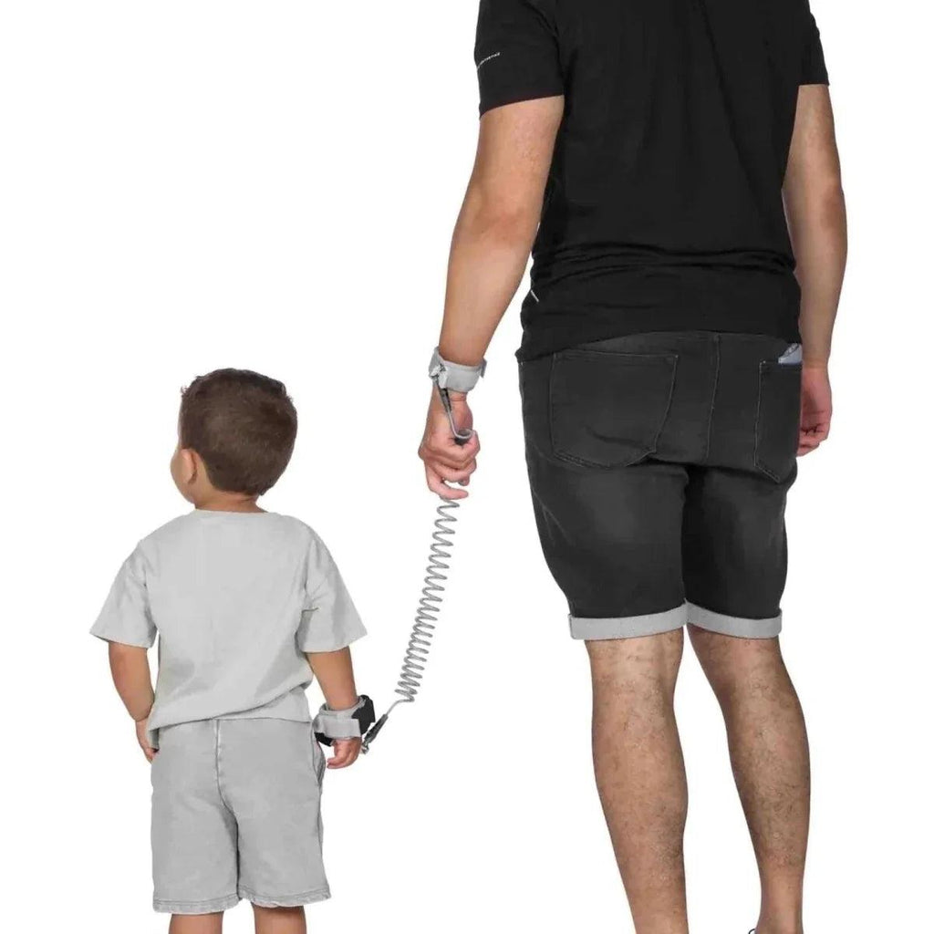 Pair safety wristbands with coiled spring leash for child and adult