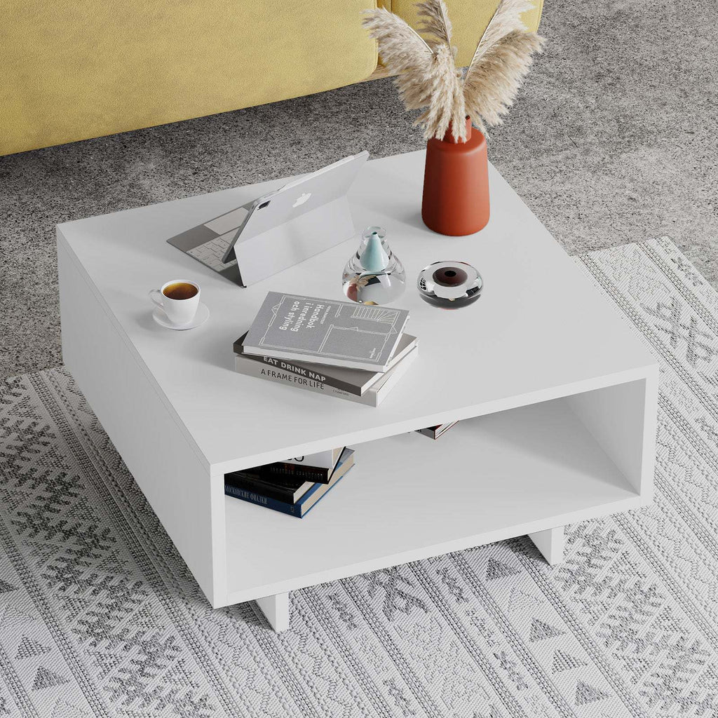 Modern coffee table in white with lower open shelf and squared frame