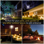 Black solar lamp post lights glowing for patio, yard, and garden paths at night