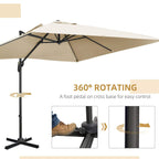 Cantilever parasol with 360° rotation foot pedal on black cross base and cream canopy