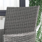 Grey woven rattan chair back and armrest with light grey cushion