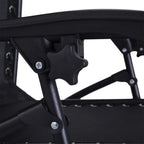 Black chair frame hinge and adjustment lever on zero-gravity lounge chair