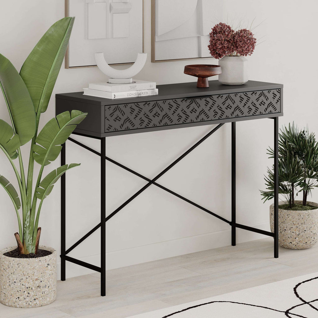 Anthracite grey console display unit with patterned drawer front and black metal X-frame legs