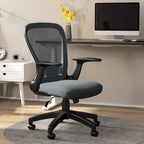 Grey office chair with mesh back, padded seat, and flip-up armrests on wheels