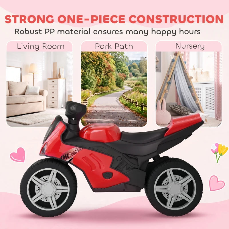 Red and black one-piece construction toddler balance bike with wide wheels