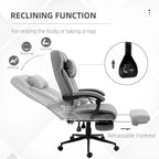 Light grey reclining office chair with retractable footrest and padded armrests