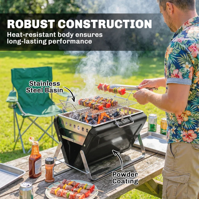 Black portable charcoal grill with stainless steel basin and side legs