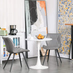 Round white pedestal bistro table with marble-look top