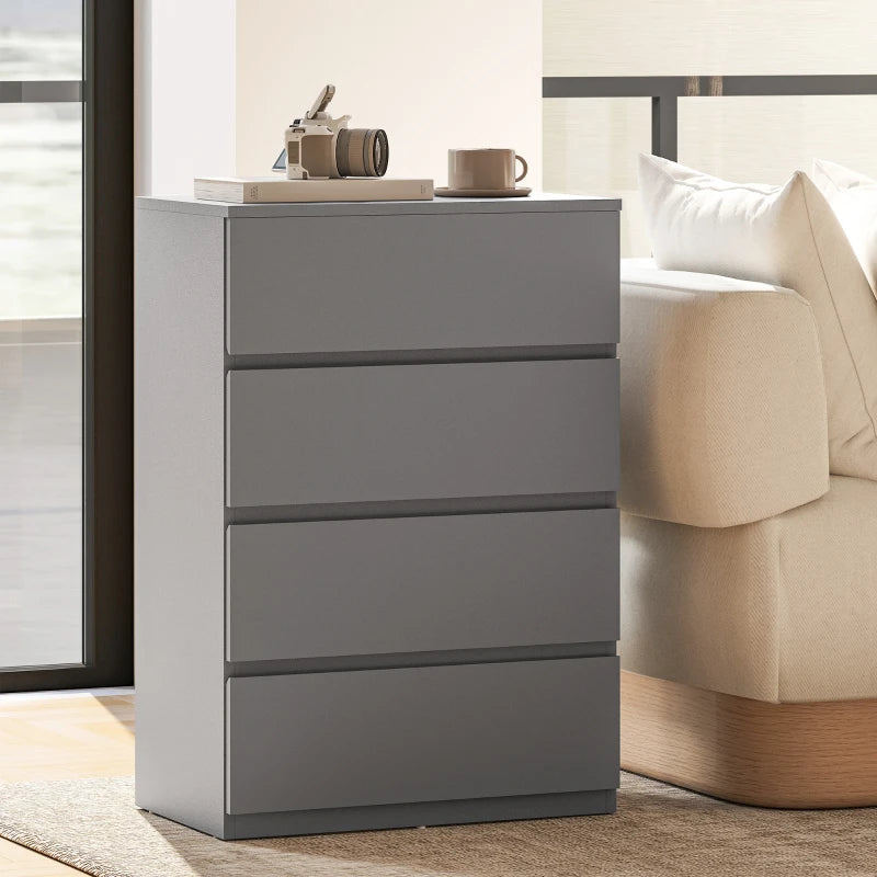 Grey 4-drawer dresser cabinet with clean-lined drawer fronts in corner room view.