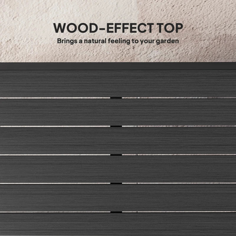Close-up of black slatted, wood-effect tabletop surface