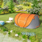 Orange and dark gray pop-up camping tent standing on outdoor grass with dual ends