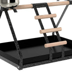 Black bird feeding stand with wood ladder steps and angled removable base tray
