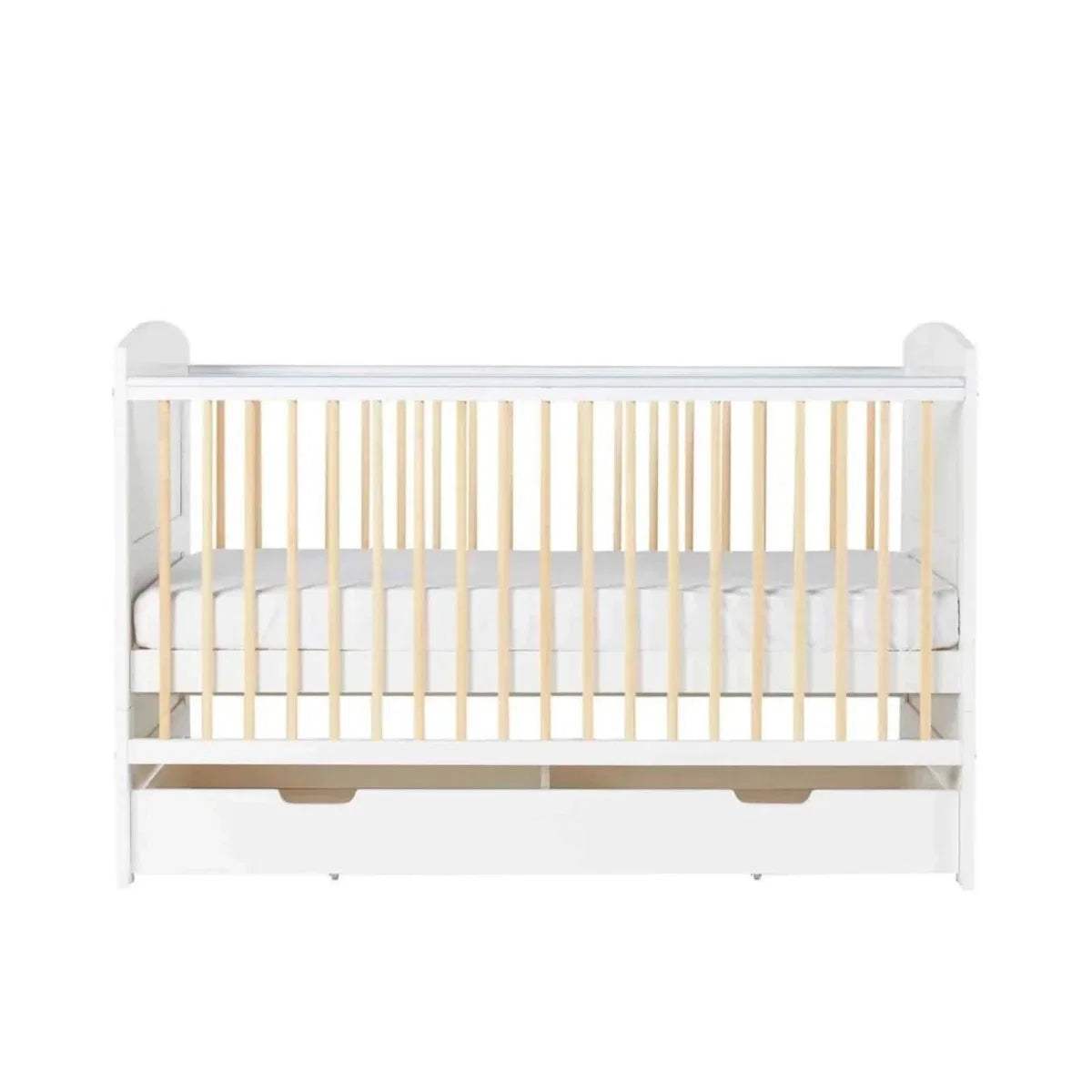 Front view of white cot bed with light wood slats and two under-drawer panels