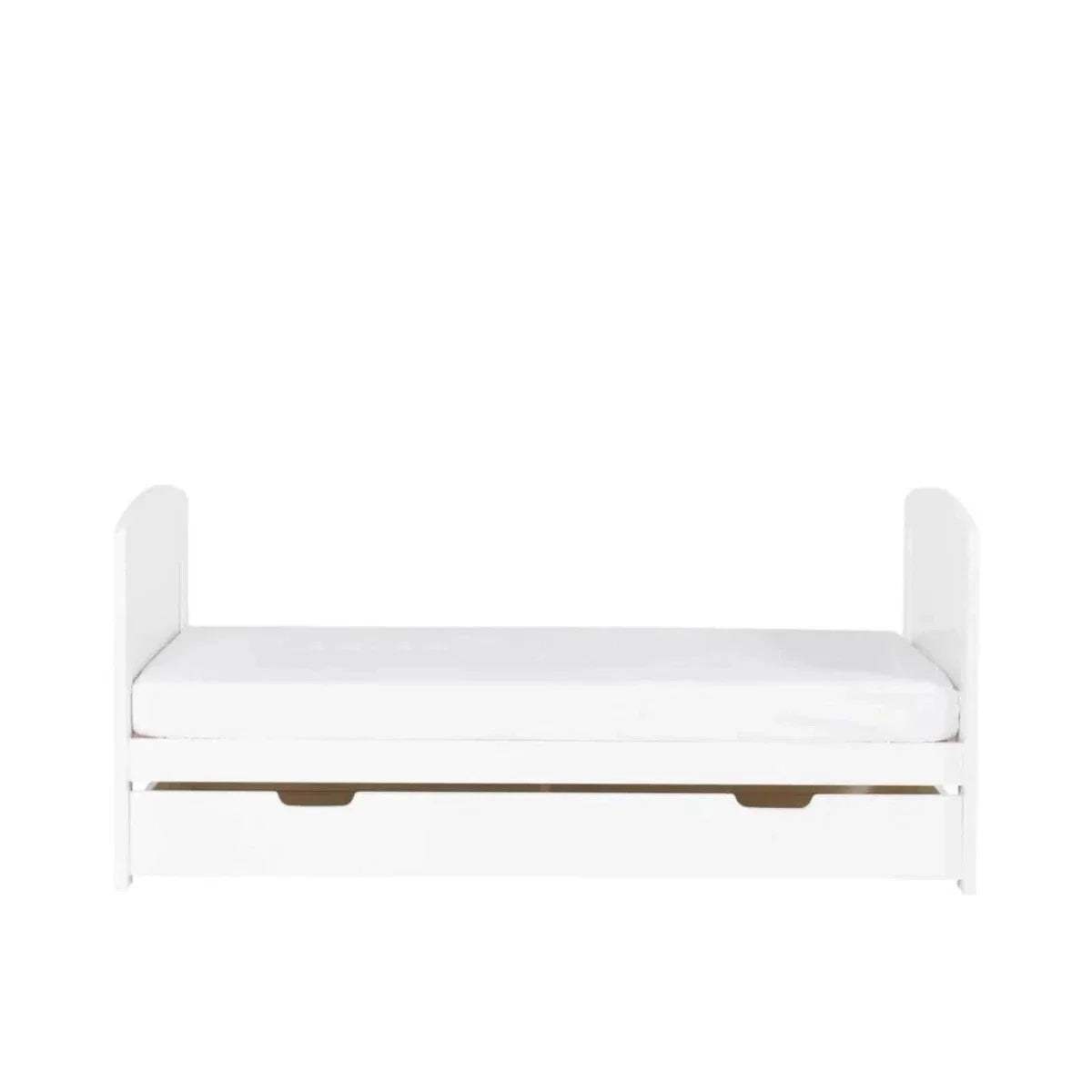 White cot bed with padded base mattress support and open under-drawer