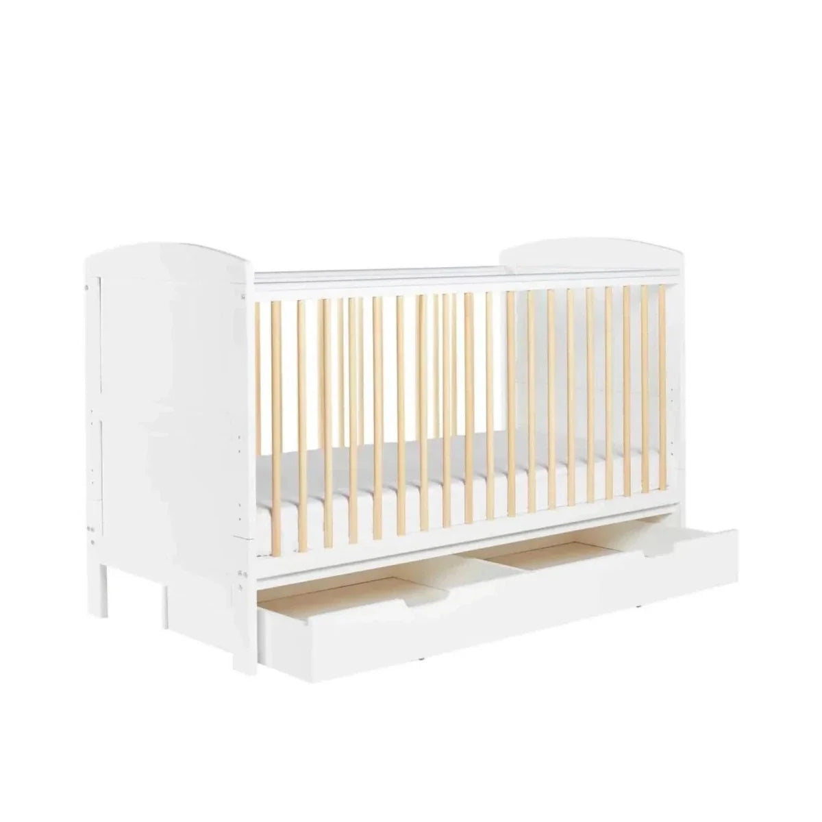 White cot bed with light wood slats and open under-drawer compartment
