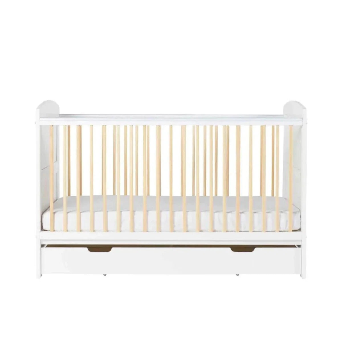 White cot bed front view with light wood slats and clear under-drawer