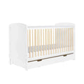 White cot bed with vertical slat sides and under-drawer base