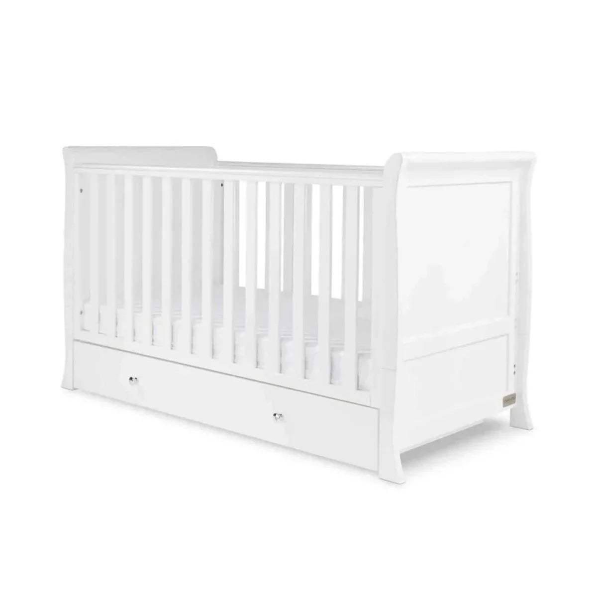 White cot bed with slatted sides and front drawer base
