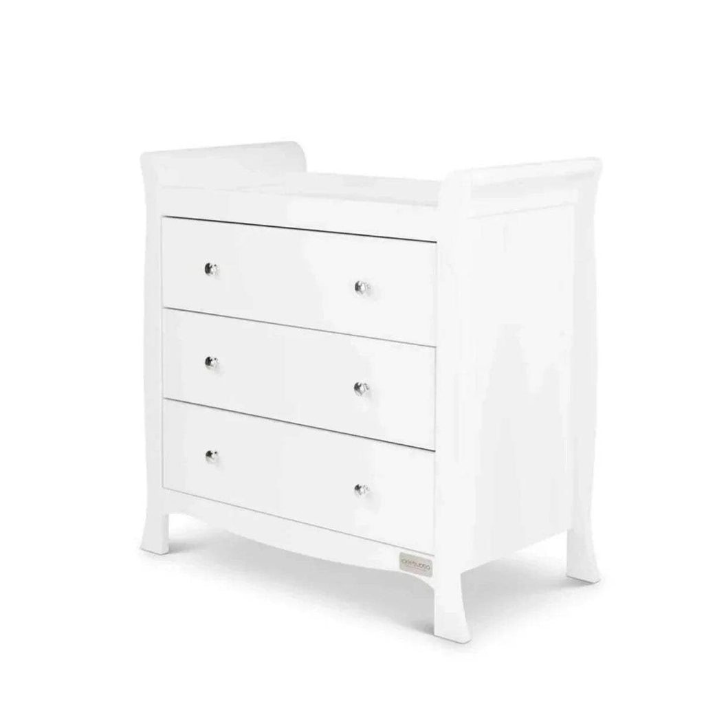 White three-drawer chest with cushioned top and rounded knobs