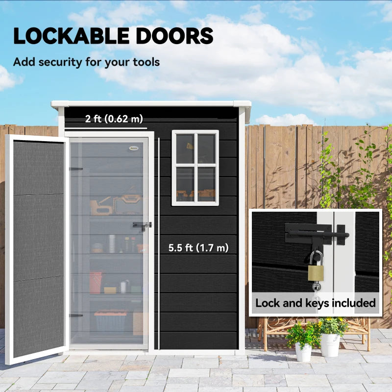 Black lockable garden shed door with two-pane window and lock detail