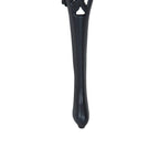 Black curved cast metal table leg with glossy finish