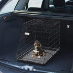 Black metal collapsible dog travel crate with removable tray and door front view