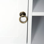 Bronze metal ring door handle on white cabinet door