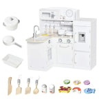 White kids wooden play kitchen set with sink, stove knobs, and side fridge door