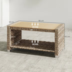 Rectangular light brown rattan coffee table with open lower storage shelf and foot pads