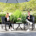 Two grey textilene rocking chairs with a glass-top table between them