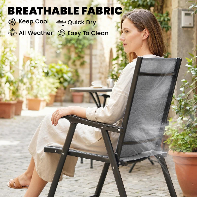 Light gray texteline folding garden chair with black frame and armrests