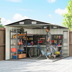 Dark grey outdoor storage shed interior with shelving and open doors