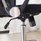 Black and silver office chair height-adjust lever and support column close-up