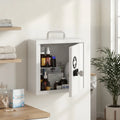 Wall-mounted white medicine cabinet open with bottles on interior shelves