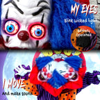 Clown face prop with blue wig, bright red eyes, and ruffled collar