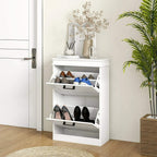White two-drawer shoe cabinet with open shelves holding shoes; black drawer handles