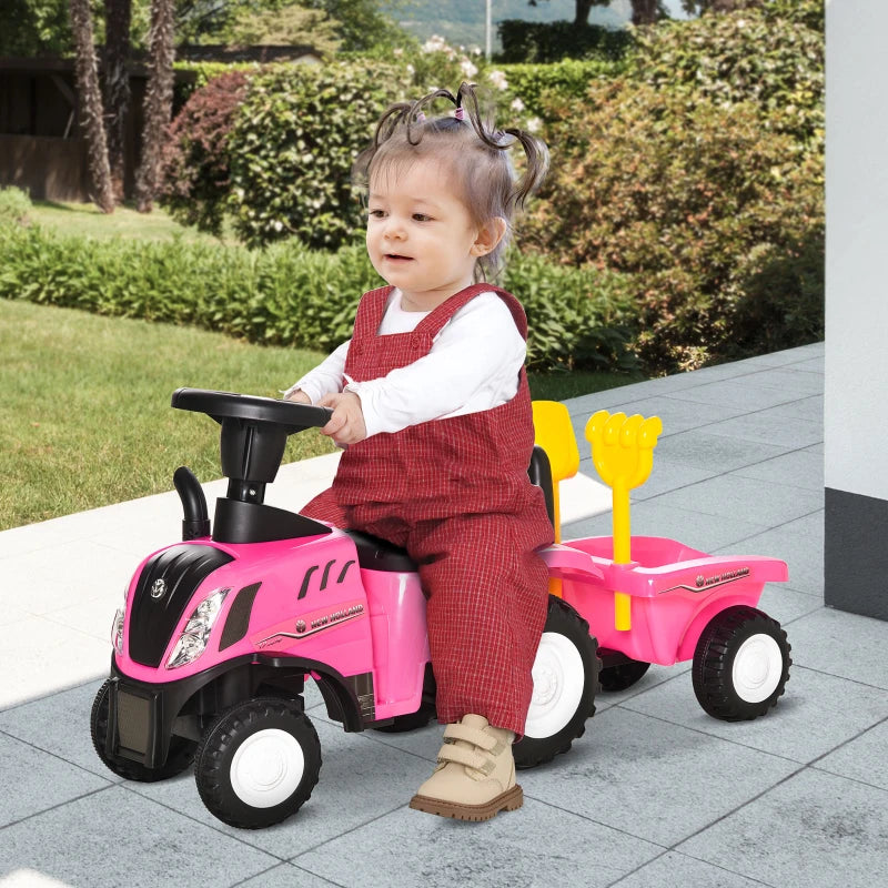 Pink ride-on tractor toddler walker with black seat, yellow handle, and seated child