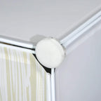 White storage unit frame corner connector with a round cap on the cube structure