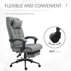 Light grey swivel ergonomic chair with headrest and padded footrest on caster base