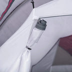 Tent interior side storage pocket with tie straps and rolled accessories