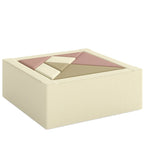 Beige foam climbing blocks set with pink and cream inserts in a square base