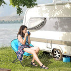 Blue padded folding camping moon chair with black frame, shown with seated person