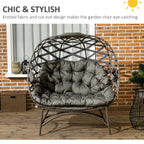 Egg chair with dark sand-brown woven frame and gray tufted seat cushion