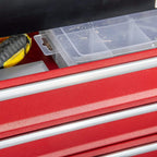 Close-up of red drawer front with clear plastic organizer tray in a metal tool chest.