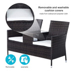 Dark brown rattan 2-seat chair set with removable-looking white cushions and glass side table